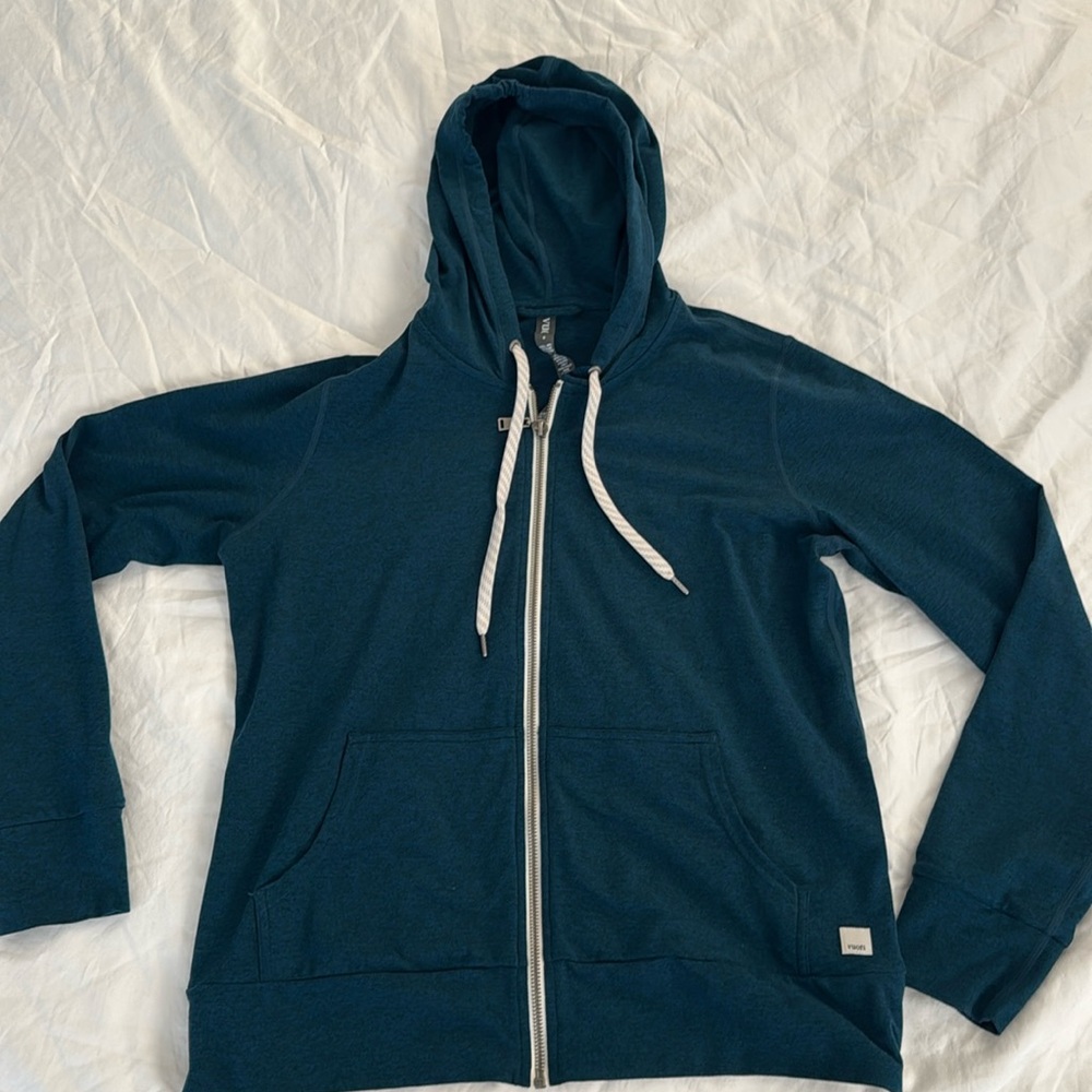 Vuori deep teal zip hoodie with cream drawstrings